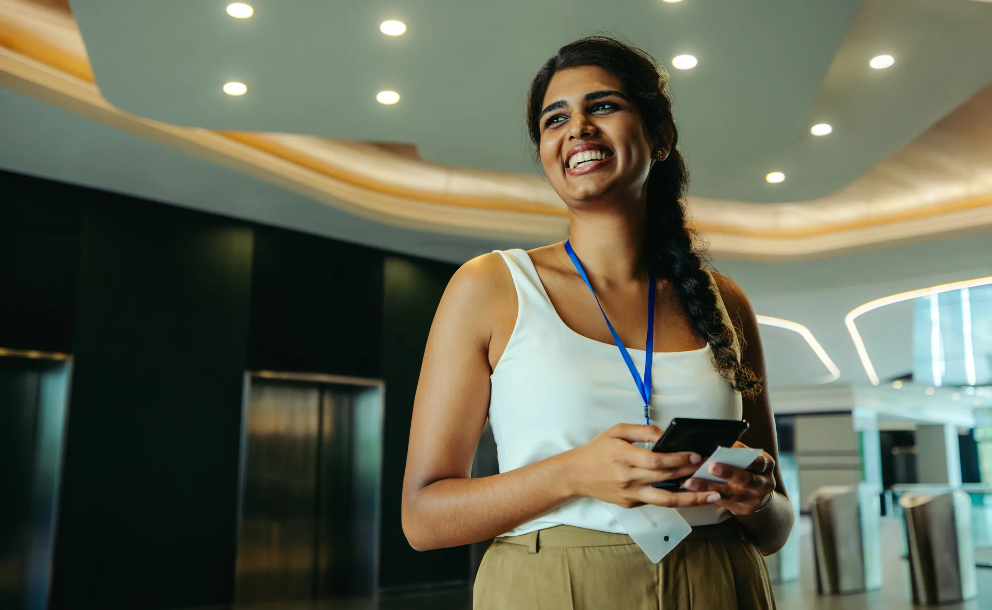 Guest at a corporate event in a hotel lobby