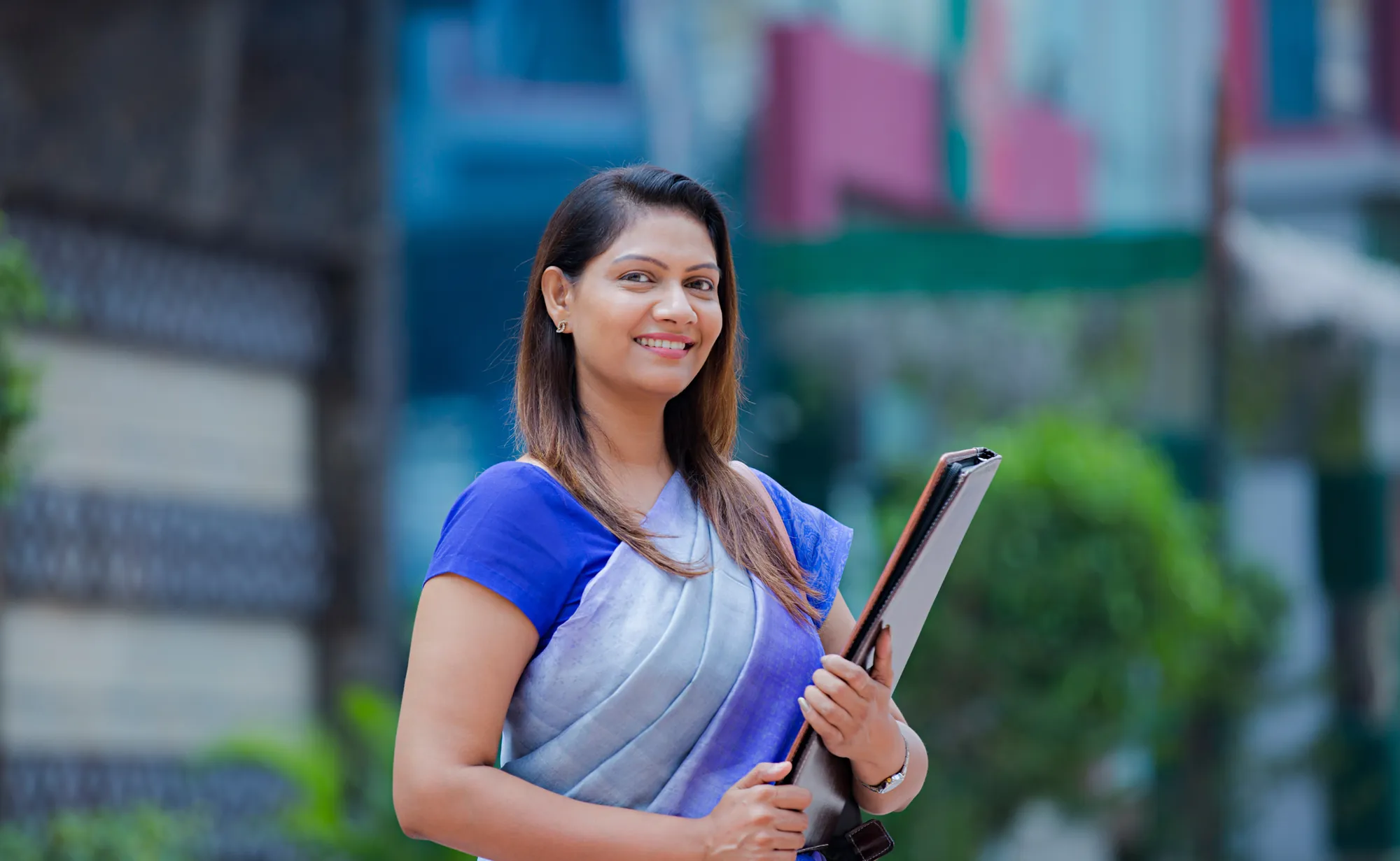 Professional portrait in a blue saree